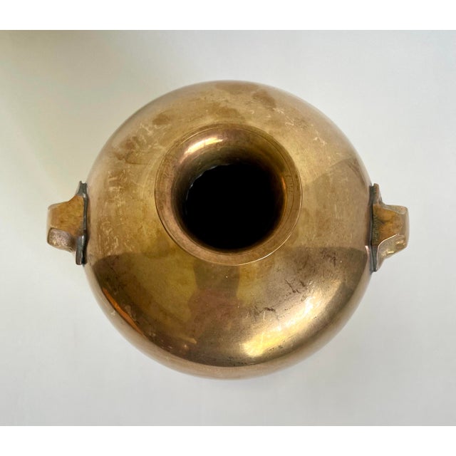 Here is a wonderful vase/vessel made of solid brass and featuring elephant heads on each side, as handles. As you can see,...