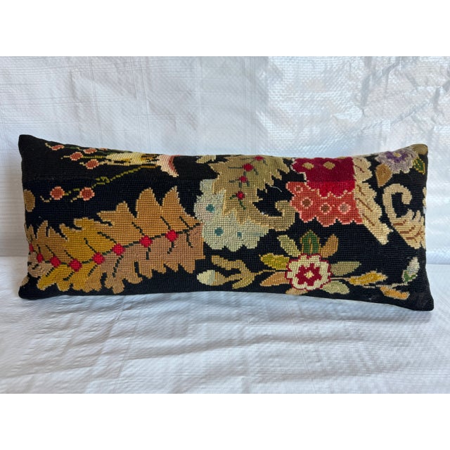 Elevate your decor with the English Needlework Pillow, sized at 19" x 8". Immerse your space in timeless charm and...