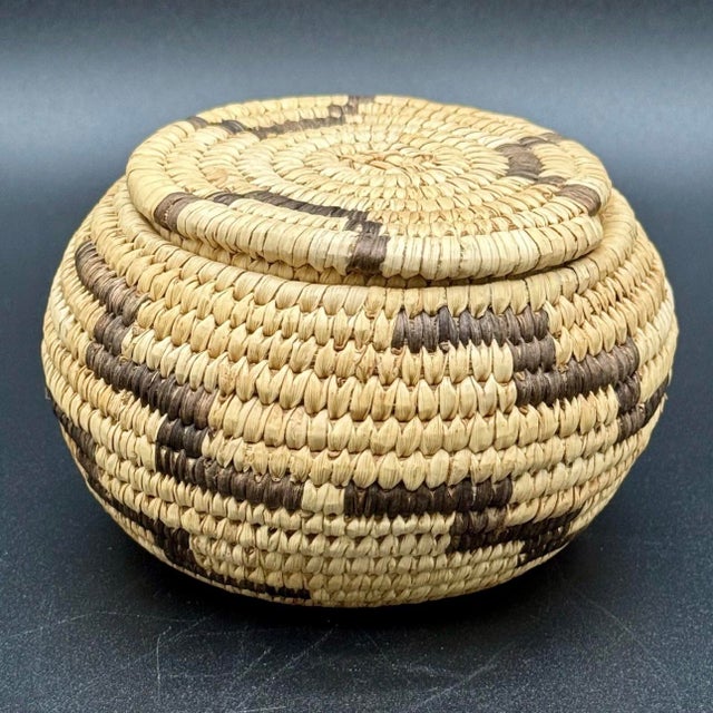 Beautiful small early 20th century basket crafted in the Native America's Tohono O’odham people style, the native people...
