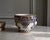 A charming vintage french hand-painted faience bowl or small vase, made in louviers, normandy, and decorated in a richly...