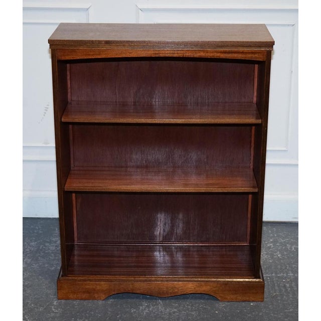 Antiques of London We are delighted to offer for sale this Charming Vintage Dwarf Open Bookcase. It features fixed...