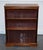 Antiques of London We are delighted to offer for sale this Charming Vintage Dwarf Open Bookcase. It features fixed...