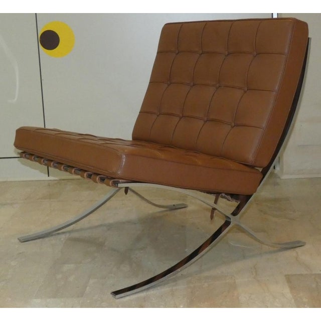 Barcelona Steel and Leather Armchair by Knoll The Barcelona armchair stands out for its stainless steel frame with a...