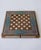 A one-of-one chess and backgammon set combining hand-cut Khatam marquetry with turquoise Tazhib-inspired painting. The...