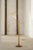 A charming Scandinavian floor lamp featuring a beautifully turned birch wood base, combining traditional craftsmanship...