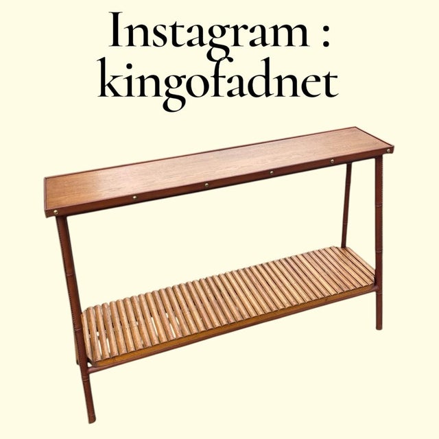 A Rare French Midcentury Modern hand stitched leather shelve by Jacques Adnet, circa 1955. Adnet had a rare talent for...
