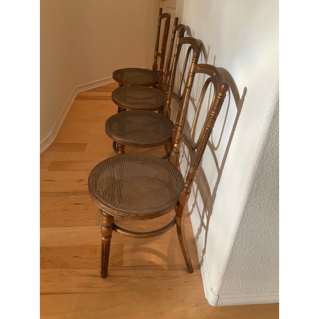 Mid-Century Modern Heywood-Wakefield Ballroom chairs with caned seats. Built to last chairs with original gilt finish...