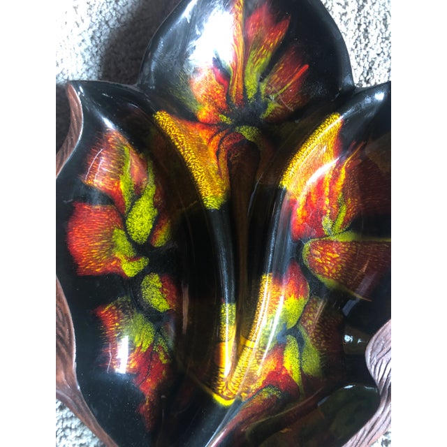 Mid century modern glazed drip dish divided bowl. Beautiful colors orange, green, yellow and brown I. A shape of a leaf....