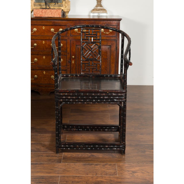 Pair of Chinese Ming Dynasty style 1920s horseshoe back bamboo armchairs a pair of Chinese Ming Dynasty style horseshoe...