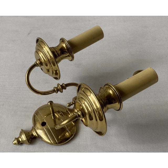 Good condition This double-arm fixture features a classic Colonial Revival design, often referred to as a Dutch baroque...