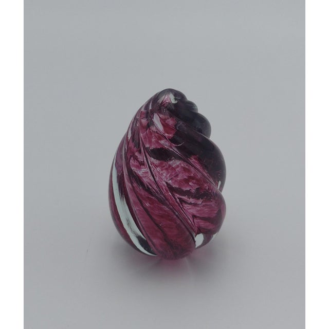 Elevate your desk or display shelf with this exquisite vintage handblown glass paperweight, signed OBG 1993. Crafted with...