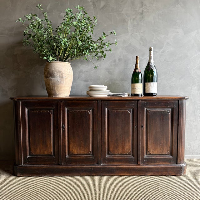 Bennett Bistro Cabinet This cabinet is constructed of reclaimed wood, with a beautiful time worn finish in a dark...