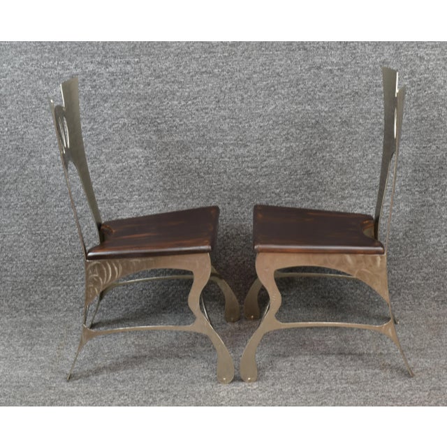 A Pair of Fanciful Bohemian Accent Styled Brush Chrome and Oak Chairs, perfect for game rooms, hallways, kid's room, and...