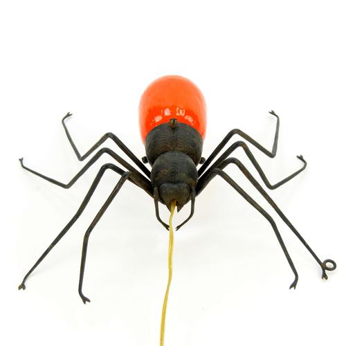 Spider light, circa 1925. An exceptional spider light, made from wrought iron. The structure of the spider’s body is...