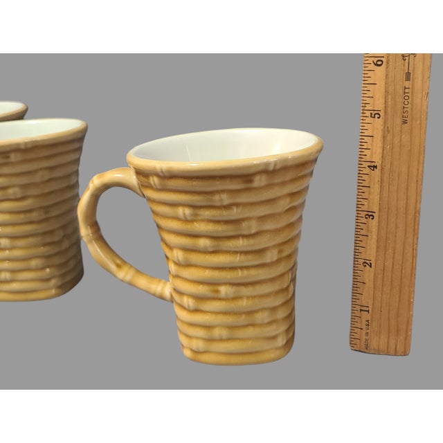 Crafted with an eye for the exotic, this set of four majolica ceramic mugs invites a touch of tropical elegance to your...