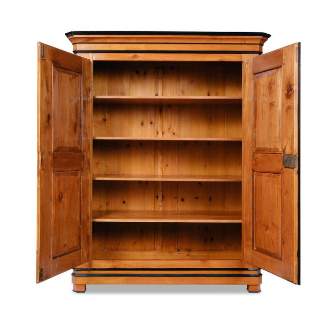 Biedermeier Hallway Wardrobe, circa 1830 Rhineland/Mainz Region Cherry wood with walnut inlay on the doors Ebony...