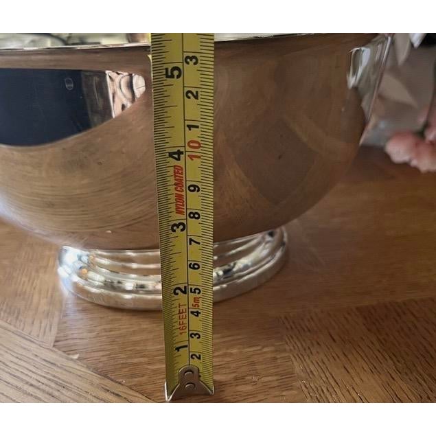 The Gorham YC784 is a vintage mid-century silver-plated footed serving bowl produced by the Gorham Manufacturing Company....
