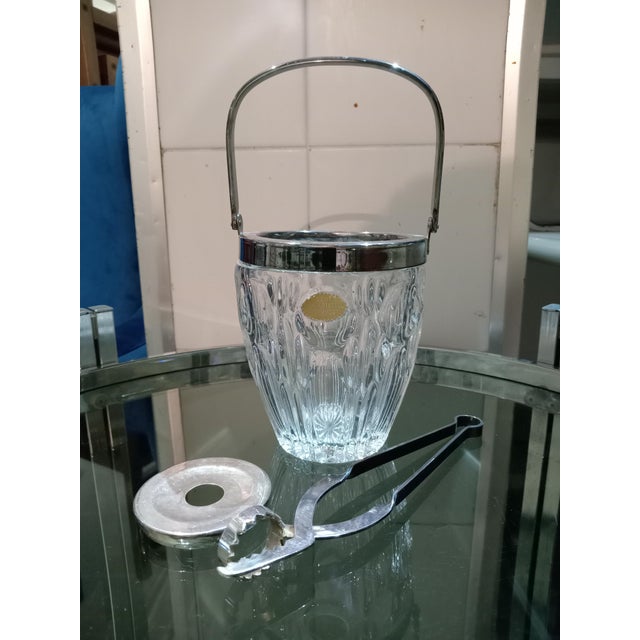 Crystal and Sheffield ice bucket, complete with tongs and ice/water separator, made in Germany in the 1960s.