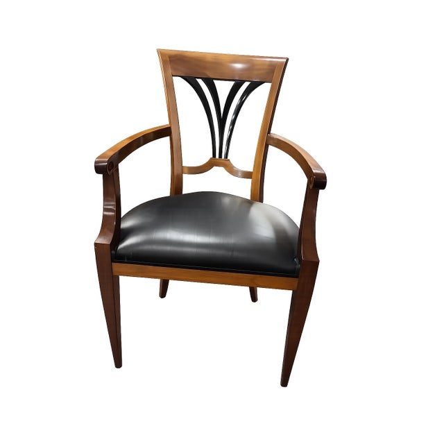 Elegant and beautifully scaled, this exceptional set of ten Biedermeier-style dining chairs offers timeless European-...