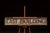 Industrial Vintage “East Building” Painted Wood Directional Sign For Sale - Image 3 of 11