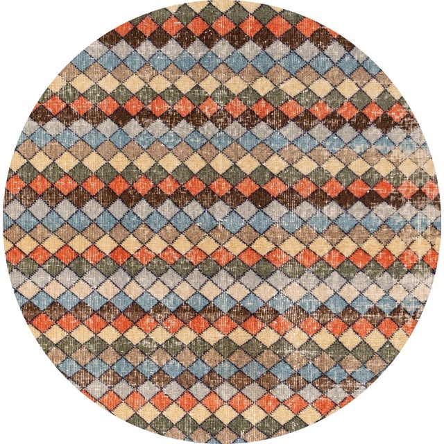 Beautiful Vintage Turkish rug, hand-knotted wool with a multi-color field in a gorgeous all-over geometric design. This...