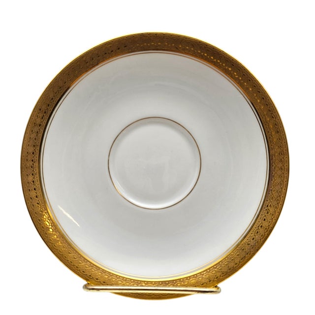 This pair of mid-century saucers was produced by Charles Ahrenfeldt in Limoges, France between 1945 and 1969. Each piece...