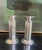 Set of two stamped Swid Powell Candlesticks, made in Italy in the 1980's. Designed and stamped with architect Robert A.M....