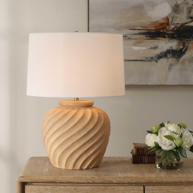 Handcrafted From Terracotta, This Table Lamp's Organic Texture Evokes The Serene, Flowing Lines Of Sand Dunes. The Design...