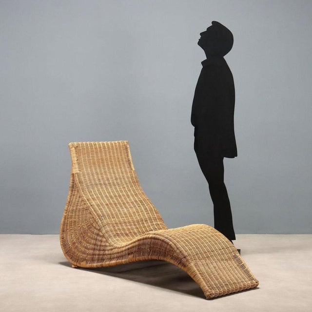 Chaise Longue, bamboo and woven wicker structure. This piece is attributed to the mentioned designer/maker. It has no...