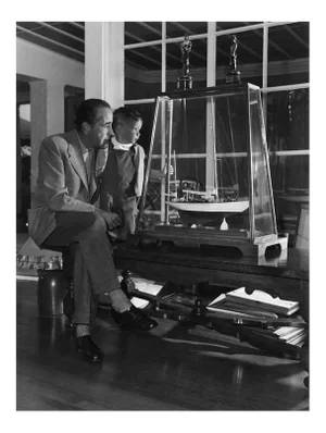 Humphrey Bogart and Son, Stephen, at Home 1952 (Photo by Sid Avery)