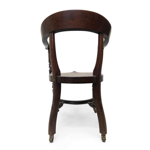 Early 20th Century Wooden Captain's Chair | Chairish