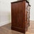Beautiful vintage serpentine-front chest of drawers in a rich mahogany finish. This piece features original brass hardware...