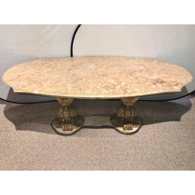 One of a kind spectacular Palatial Baroque Italian carved and painted base marble top center or dining table. The center...