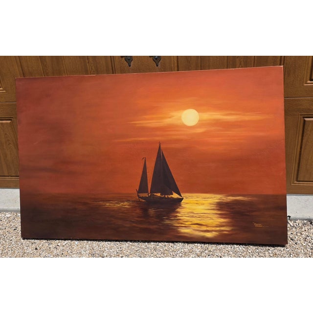 Beautiful sunset with sailboat.