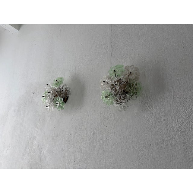 Extremely rare set of green and clear Murano blown flower sconces. Adoring 7 big flowers on each. Will be newly re-wired...