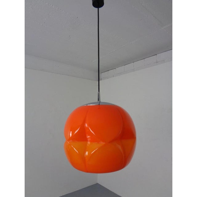 Putzler ceiling lamp made of orange glass from the 1960s. This piece has an attribution mark, I am sure that it is...