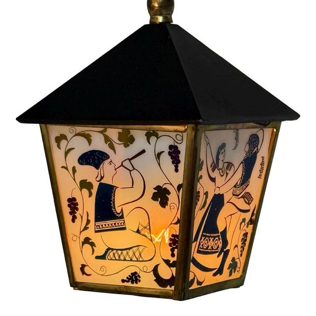 Art deco style table / desklamp shaped like a lantern. A vintage example from the 1960’s in great condition. A black metal...