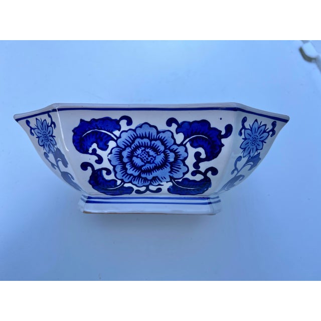 Beautiful blue and white floral bowl. Has eight sides. Many ises for this unique dish. This could be used as a catch all...