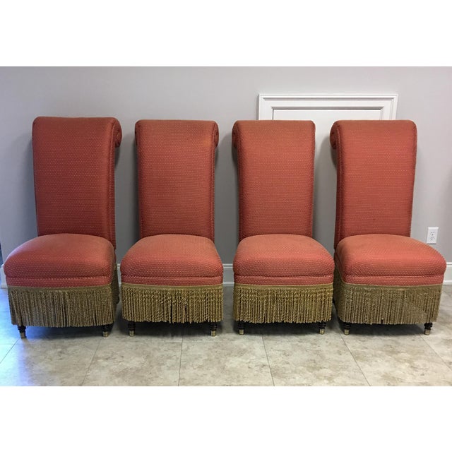 A stunning set of four Lillian August "Carlyle" dining chairs made by Drexel Heritage Furniture, Inc. The chairs are...