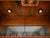Monumental Carved Wood Home Bar Armoire With Mirrored Interior, Wine Storage & Mini Fridge For Sale - Image 13 of 14