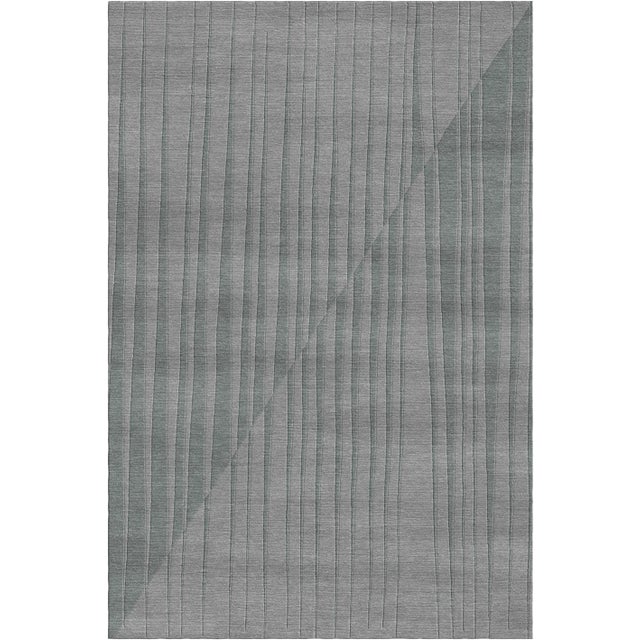 A fascinating combination of tradition and innovation, this rug will be an eye-catching statement piece in any modern...