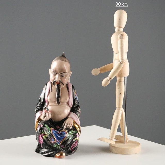 Figure in hand-decorated ceramic. Author's signature engraved under the base. This piece is attributed to the mentioned...