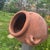 This vintage large scale handmade terracotta clay fallen garden planter is a unique and eye-catching piece that would make...