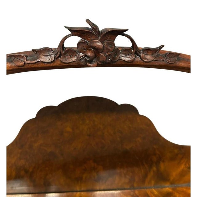 A gorgeous Victorian walnut whatnot or mirrored étagère dating to around 1860–1880 Crafted in richly figured walnut...