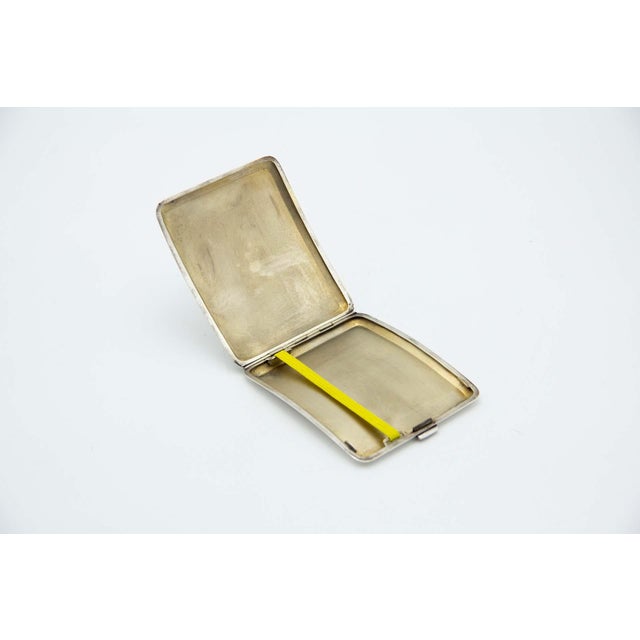 Brushed Silver Cigarette Case with Concave Rectangular Shape, in Very Good conditions. Designed 1920 to 1949 This piece...