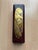 This antique, oblong japanese wooden box measures approximately 5.4 × 28.2 × 8.4 cm (h/w/d) and is lacquered in a dark...