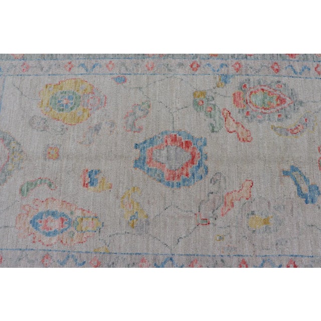 Cream Modern All-Over Floral Oushak With Muted Background and Accent Colors For Sale - Image 8 of 13