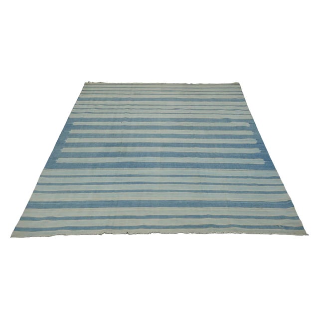 This 5x8 vintage Dhurrie rug is an exciting new curation from Rug & Kilim’s latest acquisition of rare and exemplary mid-...