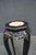 Antique Chinese plant stand crafted of dark hardwood, featuring an octagonal pink marble inset top with a beaded edge. The...
