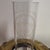 An authentic late 19th-century oil lamp featuring the renowned Kosmos Brenner burner mechanism, a hallmark of German...